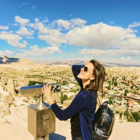 female tourist looking at city